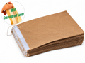 Stack of brown paper bags with a close-up inset showing a bag with a greaseproof layer.