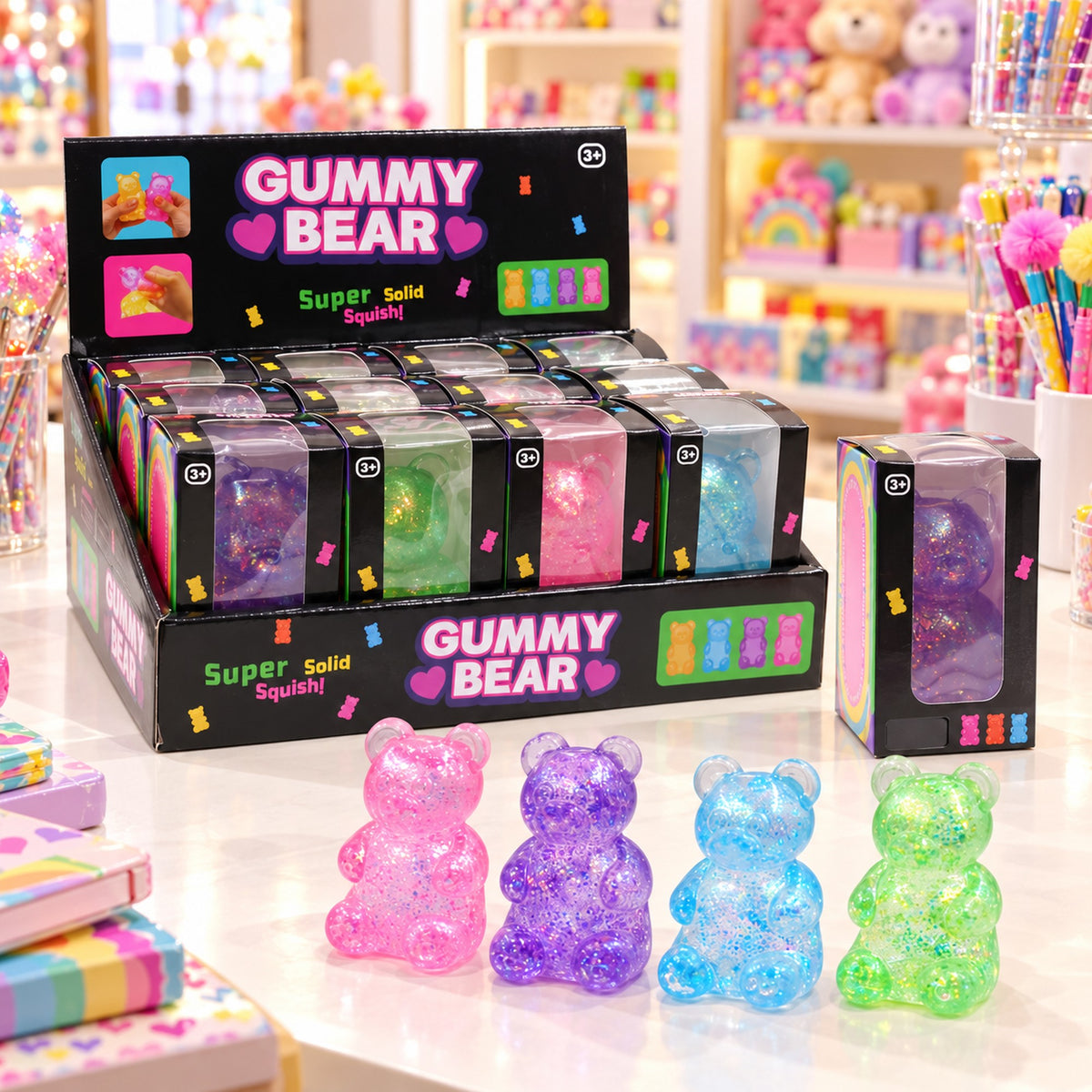 Gummy Bear glitter squishy toy retail display box on a gift shop counter