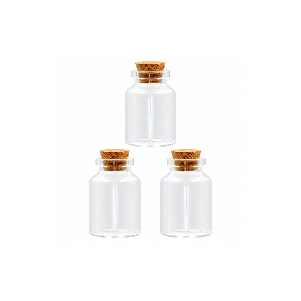 Three 16ml clear glass mini craft jars with natural cork lids on a white background