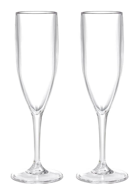 Clear acrylic champagne flutes 160ml arranged on a wedding reception table, reusable plastic stemware for events
