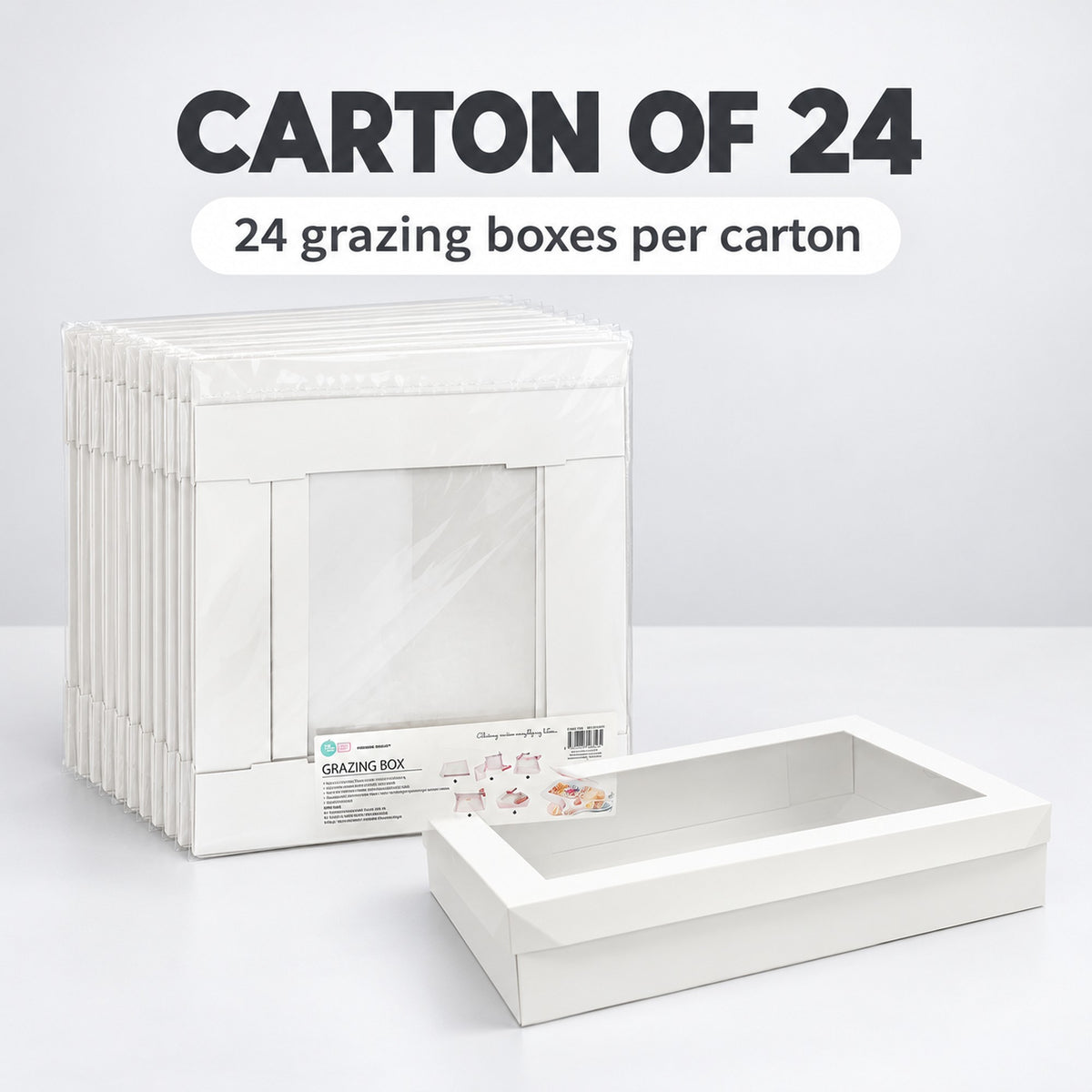 Carton of 24 white grazing boxes with a single assembled box