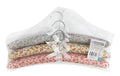 3-pack decorative satin padded velvet coat hangers in assorted designs, suitable for boutique retail display