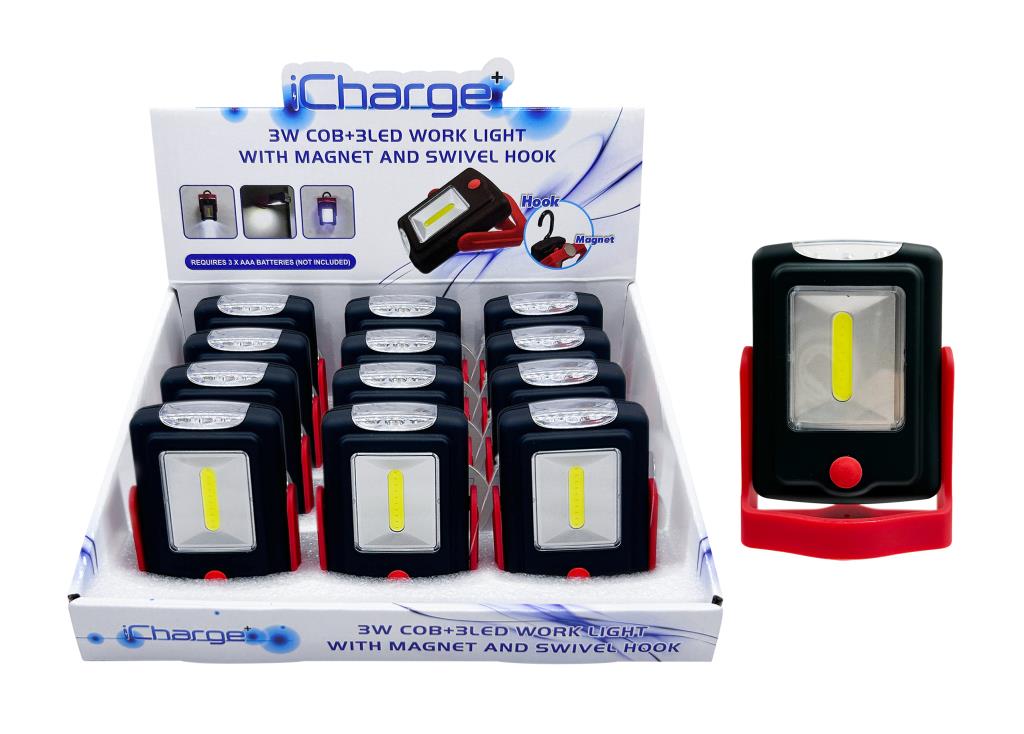 DUR8312 compact 3W LED work light 97x65x34mm with magnet base and swivel hook, shown standing on steel surface in workshop