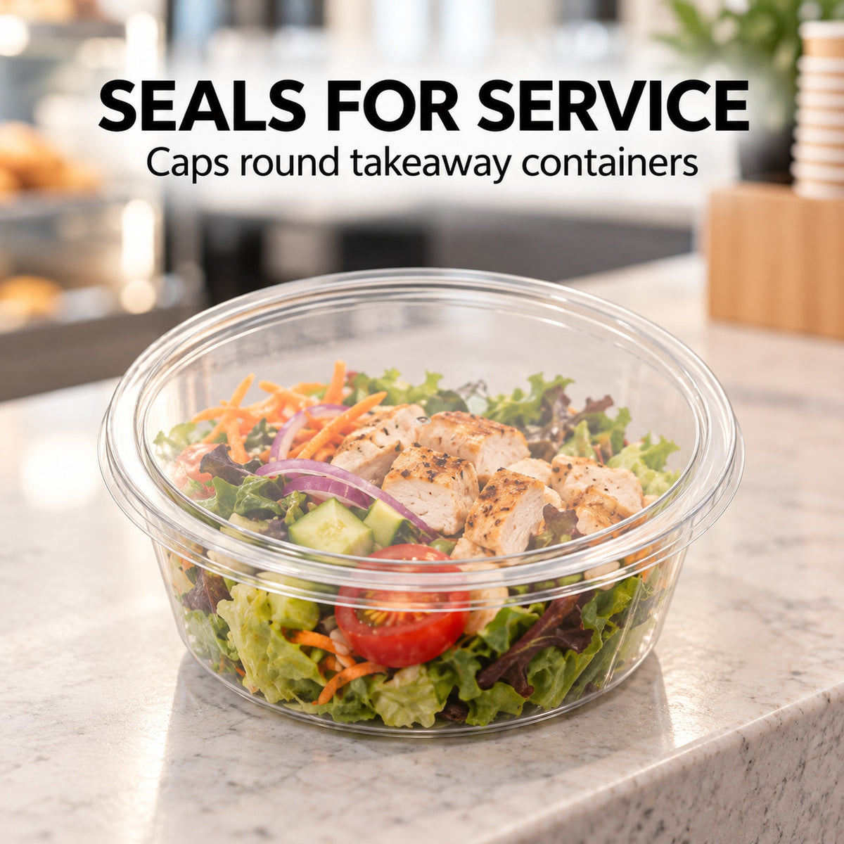 Clear round container lid sealing a round takeaway container at a cafe