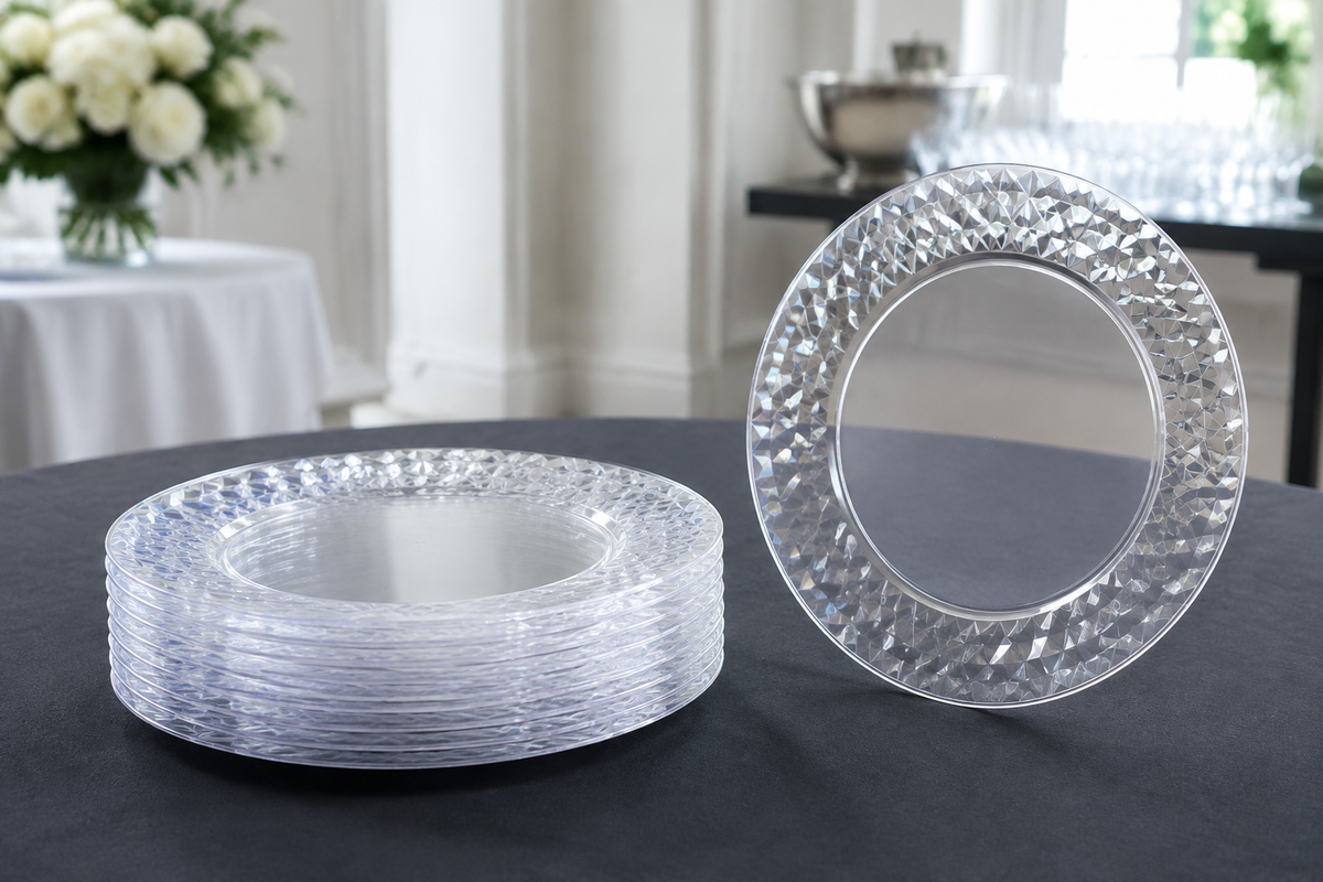 Reusable acrylic plastic dinner plates stacked ready for a function service